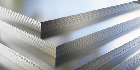 steel or aluminum sheets in warehouse, rolled metal product.
