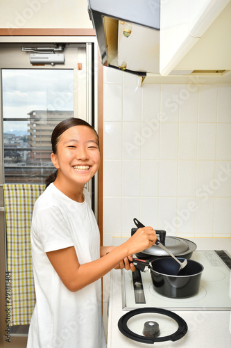 料理をする女の子 Buy This Stock Photo And Explore Similar Images At Adobe Stock Adobe Stock