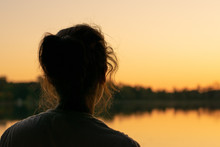 Girl Looking At Sunset
