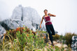 © Micky Wiswedel/Stocksy - Female trail runner in misty mountains