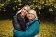 © Rob and Julia Campbell/Stocksy - Mature parent with grown child