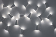 Light fixtures, unusual ceiling lamps. Design pattern. Cold lights. White colors of pattern. Modern design lighting. Contemporary interior lightning design. Modern indoor lighting concept