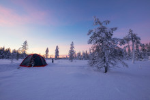 _amping tent in winter lapland forest. Winter view in Lapland (Finland).