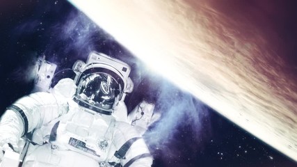 Wall Mural - astronaut in space suit in the space with nebula and stars. elements of this video furnished by nasa
