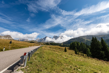 Mountain pass (Passo Rolle) and Dolomites in Italian Alps (Pale di San Martino and peak Cimon della Pala), UNESCO world heritage site, Trentino Alto Adige, Italy, Europe