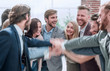 © ASDF - close up. a group of corporate employees showing their unity