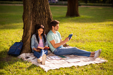 Poster - Her she his he nice attractive smart clever intellectual inspired best friends buddy fellow spending weekend free time on fresh open air sitting under tree on veil cover outside