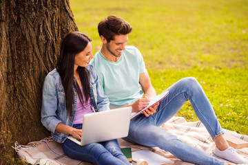 Poster - Her she his he attractive lovely charming cheerful cheery married spouses studying preparing homework task writing exercise sitting on veil cover grass springtime outside