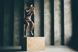 © Mariia Korneeva - Fitness woman jumping on box while training at the gym,girl doing cross fit exercise. Sports concept, and healthy lifestyle.