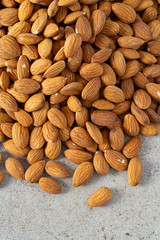 Sticker - almond nuts on granite background