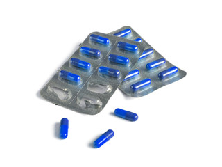 Wall Mural - Blue gelatin capsules in shiny blister packs