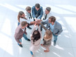 © ASDF - top view. corporate business team showing their unity