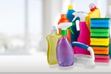 Fototapeta  - Plastic bottle, cleaning sponge and gloves  on background
