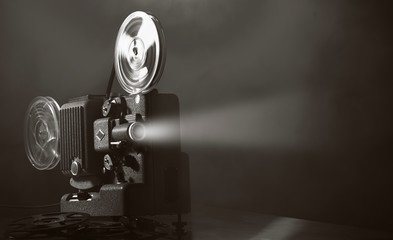 Wall Mural - Vintage film projector and film screening