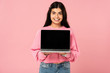 © LIGHTFIELD STUDIOS - beautiful girl showing laptop with blank screen, isolated on pink