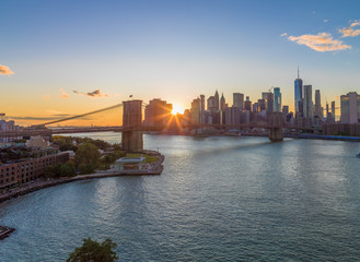 Wall Mural - New York City skyline buildings Brooklyn Bridge evening sunset