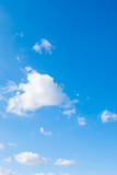 Fototapeta Niebo - Blue sky background with cumulus clouds.