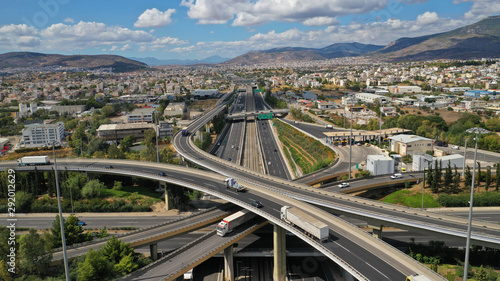 Cuadros en Lienzo Aerial photo of multilevel junction highway overpass in urban area with beautifu