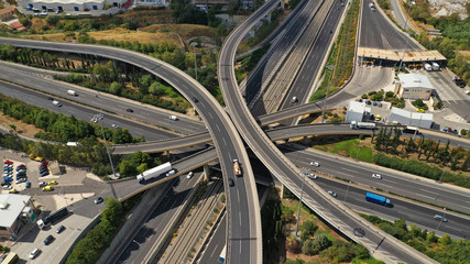 Wall Mural - Aerial view of popular highway multilevel junction road, passing through National motorway and Attiki Odos, Attica, Greece