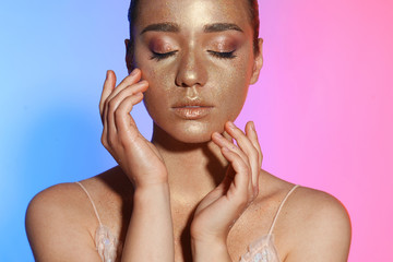 Poster - Beautiful young woman with glitter makeup on colorful background