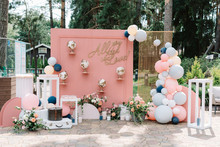 Beautiful And Stylish Location For Wedding Photos Decorated With Balloons, Flowers And Original Globes