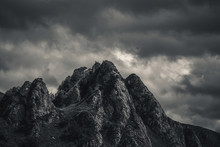 Mysterious Black Mountain With Dramatic Cloudy Sky