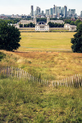 Wall Mural - London panorama seen from Greenwich park viewpoint. Symbolic Broken fence in the foreground