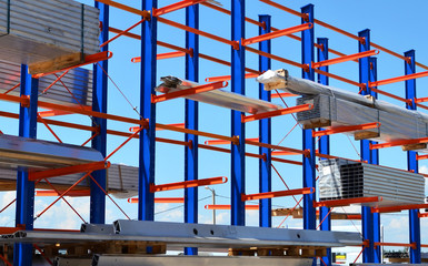 Warehouse Cantilever Racking Systems for storage Aluminum Pipe or profiles. Pallet Rack and Industrial Warehouse Racking. Steel profiles, sheet metal build-profile - Image