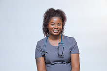 Portrait Of A Young Attractive African American Woman, A Happy Young Nurse 