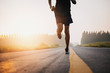 © sutadimages - Athlete runner feet running on road, Jogging at outdoors. Man running for exercise.Sports and healthy lifestyle concept.