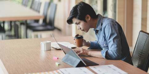 Wall Mural - professional male ui web developer working on his project about ux template