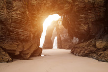 Natural Rock Arches On Cathedrals Beach In Low Tide