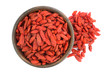 © Роман Фернаті - goji berries in ceramic bowl isolated on a white background.