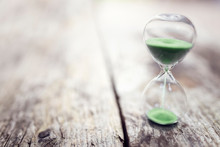 Green Hourglass Background Concept For Time Or Ecology And Environmental Conservation