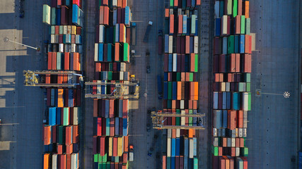 Aerial top down photo of containers in ship port for business Logistics and transportation of Container Cargo, logistic import export and transport