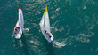 Aerial drone photo of white Sailing boats compete during sailing regatta practise in open ocean exotic sea