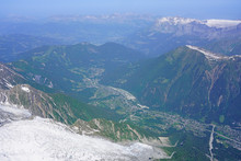 Aerial View Of The Chamonix Valley In The Massif Du Mont Blanc Near The Junction Of France, Switzerland And Italy