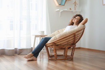 Sticker - Beautiful young woman relaxing at home