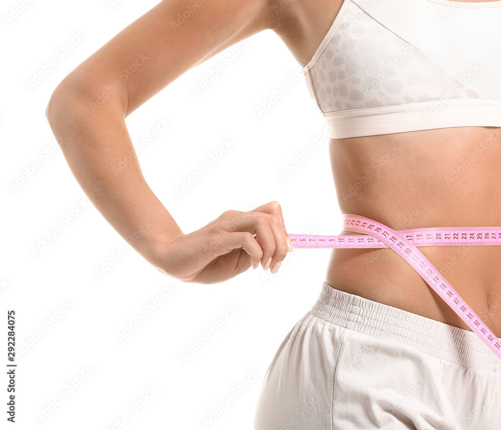 Beautiful young woman with measuring tape on white background. Weight loss concept