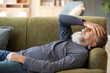 © Pixel-Shot - Senior man suffering from headache at home