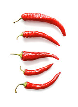 Red Chili Peppers On White Background