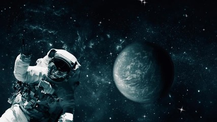 Wall Mural - astronaut in space suit in the space with planet earth and stars. elements of this video furnished b