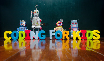 retro robots and the words CODING FOR KIDS