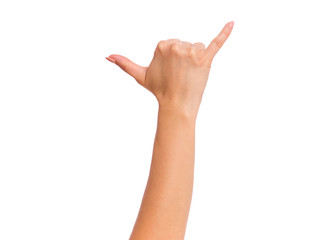 Female hand making phone sign with fingers, isolated on white background. Beautiful hand of woman with copy space.