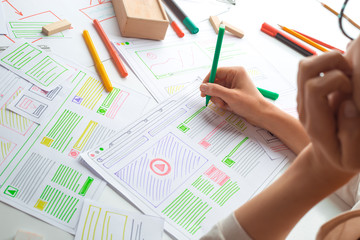 Wall Mural - website designer creates a sketch application. developing a project drawing an interface mockup.