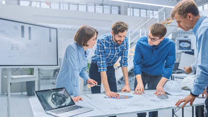 Poster - In the Industrial Engineering Facility: Diverse Group of Engineers and Technicians on a Meeting Gather Around Table with Engine Design Technical Drafts, Have Discussion, Analyse Technology