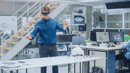 Aufkleber - Engineering Software Developer Wearing Virtual Reality Headset Uses Gestures to Interact with Augmented Reality while Designing Industrial Engine Model in Modern Facility. AR Mock-up Concept