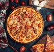 Chicken pizza with tomato, bell peppers, mushroom, and cheese