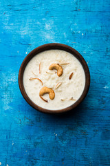 Canvas Print - Rice Kheer or Firni or Chawal ki Khir is a pudding from Indian subcontinent, made by boiling milk ,sugar and Rice. Served in a bowl