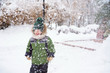 © nagaets - Kids walk in the park with first snow